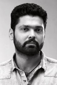 Rakshit Shetty as Dharma