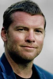 Sam Worthington as Dennis Huxley
